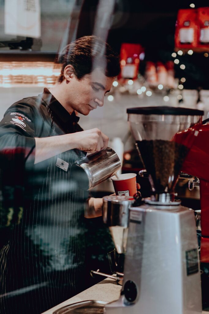 Man Working at Cafe